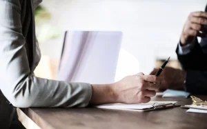 Client and U Visa Immigration Lawyer in discussion