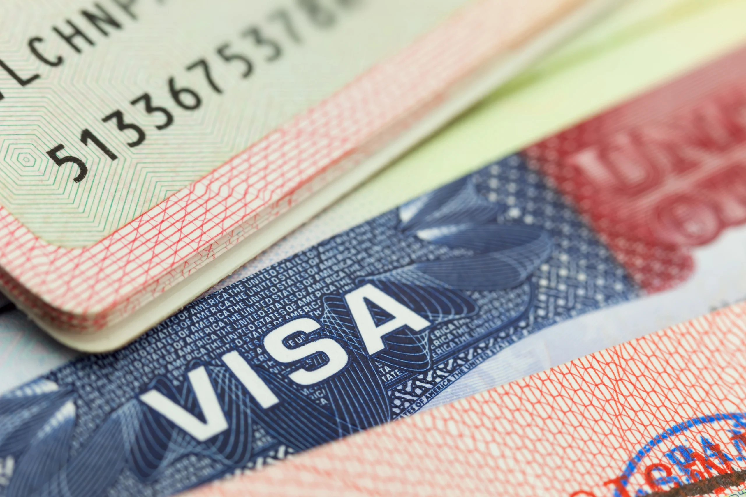 a-us-visa-and-a-passport-shown-together-symbolizing-the-process-of-securing-residency-in-the-united-states-us-golden-visa-your-pathway-to-living-in-los-angeles-ca-or-new-york-ny